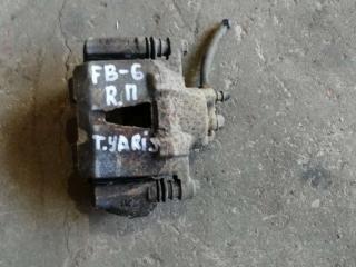 суппорт передний правый Toyota Yaris P1 2001, 1.0 л., бензин, МКПП, хетчбэк 5 дв.